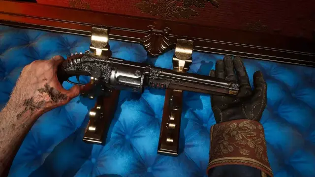 William holds the ornate Pistol above a blue-lined carriage display.