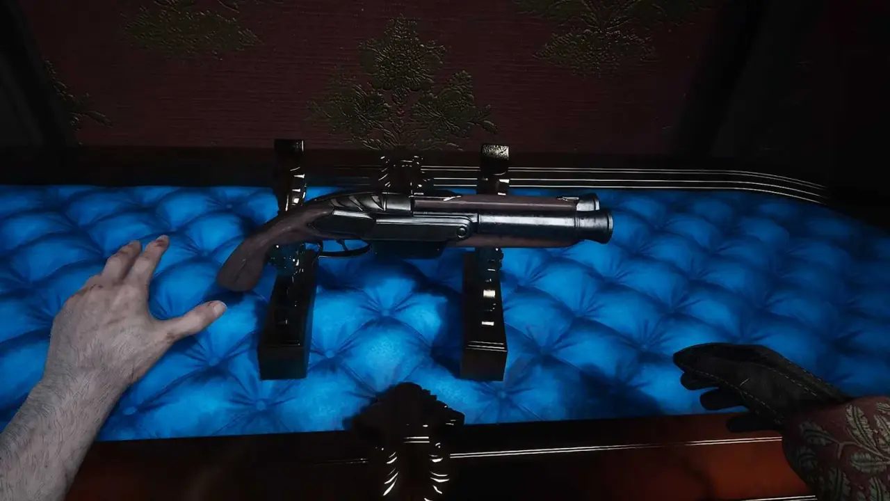 The Blunderbuss resting on a blue-lined display inside the carriage